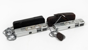 MINOX: Two c. 1960s chrome-body Minox B subminiature cameras [#837451 & #880004], one of which with uncommon 'B' engraving on rear, both in leather case with chain. (2 cameras)