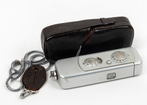 MINOX: Minox A subminiature camera [#136029], c. 1947, with Complan 15mm f3.5 lens, leather case, and chain. Featuring 'Wetzlar - Made in Germany' engraving on rear.