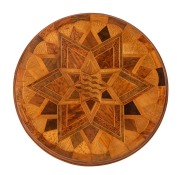 An antique New Zealand exhibition parquetry starburst tabletop, most likely Winks & Hall, Auckland, in the manner of Seuffert, mounted on later Australian blackwood Arts & Crafts base, the top 19th century, 77cm high, 59cm diameter - 2