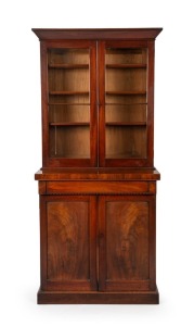 An early Colonial Australian cedar bookcase with crossbanded edge and astragal glazed doors, Tasmanian origin, early to mid 19th century, 211cm high, 95m wide, 48cm deep