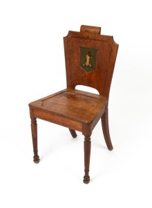 An antique oak hall chair with hand-painted shield&nbsp;crest back, 19th century, 92cm high