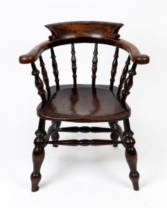 An antique English elm smokers bow chair with remains of Japanned finish, 18th/19th century, 80cm high, 65cm across the arms