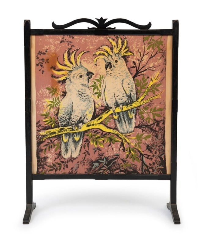 An Australian Arts & Crafts ebonised timber fire screen with Australian sulphur crested cockatoo printed fabric insert, circa 1920s-30s, 86cm high, 65cm wide, 23cm deep overall