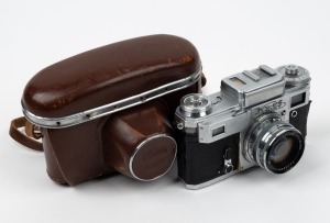 KIEV ARSENAL: Kiev 4a rangefinder camera [#7320951], c. 1958, with Jupiter-8M 50mm f2 lens [#7215026] and matching leather case.