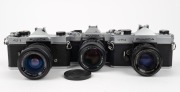 FUJI OPTICAL: Three c. 1970s SLR cameras - one Fujica AZ-1, one Fujica ST-701, and one Fujica AX-3 with front lens cap. (3 cameras) - 2