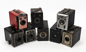 VARIOUS MANUFACTURERS: Group of eight c. 1940s box cameras - one Braun Carl Imperial, one Australian-made Foster Swiftshot, one Kodak Popular Brownie, two Kodak Six-20 Brownie C models, one Lexa Lexa 20, one Nefotaf Glory, and one anonymous model. (8 came