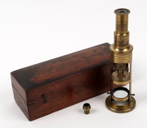 Drum-style brass microscope, 21.5cm at highest setting, in wooden box.