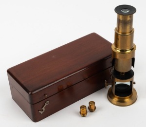 Drum-style brass microscope, 18.5cm at highest setting, in wooden box with two additional magnification elements.