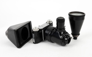 WATSON & SONS: Black-body microscope camera with two additional magnification elements.