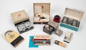 BOLEX-PAILLARD: Thirteen accessories, all in maker's boxes, including one Declic Handle, one self-timer, one shutter release, one 8mm Iris Vignetter, one 16mm film splicer, and four different diaphragm control levers, among others. (13 items)