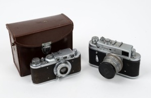 VARIOUS MANUFACTURERS: Two Soviet-made rangefinder cameras - one c. 1937 Type 1c NKVD FED with Fed 50mm f3.5 lens in leather case with stereo lens attachment and viewfinder attachment, together with one c. 1956 Krasnogorsk Zorki-4 with Industar-26m 50mm f