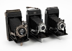 ZEISS IKON: Three c. 1940s vertical-folding cameras - two Nettar 515/2 models with varying lens/shutter/body details, together with one Nettar 518/2 with Novar-Anastigmat 105mm f6.3 lens and Vario shutter. (3 cameras)