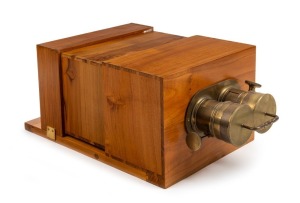 20 x 13cm plate stereo tailboard camera with twin brass Petzval lenses, double lens cap, and one double-dark slide.