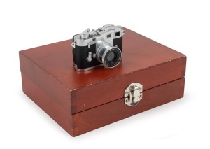 MINOX: Digital Class Camera Leica M3 subminiature camera [#8119765], c. 2008, in wooden box with USB cable and battery.