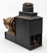Brass and tin helioscopic&nbsp;magic lantern, c. 1890s, with 7" lens and engraving on lens flap that reads 'Established 1816 - Trade Mark - London Made'. Modified for electric use. - 2
