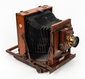 THORNTON-PICKARD: 'College'-type 4¾ x 6½" plate triple-extension field camera, c. 1912, with Ensign f8 symmetrical lens, Thornton-Pickard roller-blind shutter, and 'Ton Australia' retailer's inlay.