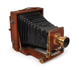 LANCASTER: '1907 B. B. Instantograph' 6½ x 4¾" plate field camera with uninscribed brass lens and unusual rear hinge mechanism.