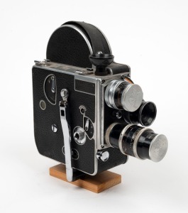 BOLEX-PAILLARD: H16-type 16mm movie camera, c. 1940s, with Switar H16 RX 16mm f1.8/Switar H16 RX 25mm f1.4/Yvar 75mm f2.8 lenses, two lens caps, and side-mounted viewfinder attachment.