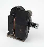BOLEX-PAILLARD: 16mm movie camera with unusual ribbed metal body [#243578], c. 1969, with Switar 10mm f1.6 lens [#1097950] and Conrac Corp Type-800P motor attachment. - 2