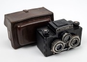 GOMZ: Sputnik stereo 120 film&nbsp;TLR camera, c. 1955, with twin T-22 75mm f4.5 lenses [#138296] and matching leather case with 'Sputnik' imprint.