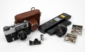 VARIOUS MANUFACTURERS: Group of seven photography items - one c. 1975 FED 5B rangefinder camera in case, one Asahi Kogaku Auto-Takumar 55mm f2.2 lens with UV lens filter, two Autoknips II models, one Sony Mavica RM-CIK, and two rangefinders. (7 items)