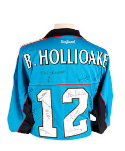 BEN HOLLIOAKE'S ENGLAND ODI UNIFORM, shirt with "B.HOLLIOAKE" and "12" on reverse, signed on reverse by 1997 England team, 14 signatures including Mike Atherton, Alec Stewart & Adam Hollioake; and trousers, made by Asics. Good condition.