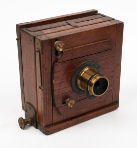 12.5 x 12cm plate tailboard camera with brass lens with four aperture settings.