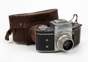 IHAGEE: Exakta II SLR camera [#663388], c. 1949, with Tessar T 50mm f3.5 lens [#3223178] and matching leather case.