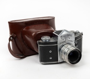 IHAGEE: Exakta Varex SLR camera [#683129], c. 1950, with Tessar T 50mm f3.5 lens [#3515242] and matching leather case.