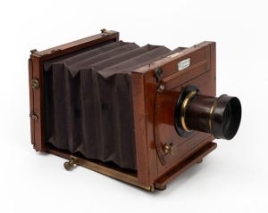 LANCASTER: 'Merveilleux' 4¾ x 6½" plate tailboard camera, c. 1886, with lens with f4/6/8/14/16 aperture markings, and 'Kemp Chemist Chester' retailer's inlay.