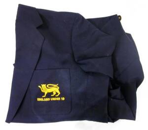 ENGLAND U19 BLAZER & JACKET, the blazer navy blue with pocket embroidered "(Yellow Lion)/ ENGALND UNDER 19", with name tag inside "Dean Cosker"; the jacket with embroidered yellow Lion, named inside "Oaky". (2 items).
