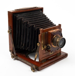 FALLOWFIELD: 4¾ x 6½" plate field camera, c. 1890s, with Beck Symmetrical lens and roller-blind shutter.