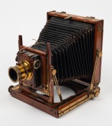 HOUGHTON: 'Triple Victo'&nbsp;4&frac34; x 6&frac12;"&nbsp;triple extension field camera, c. 1900s, with lens with f8/11/16/22/32/44/64 aperture markings and Thornton-Pickard roller-blind shutter. - 2