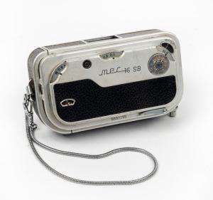 FEINWERKTECHNICK: Mec-16 SB subminiature camera [#5600295], c. 1960, with Heligon 22mm f2 lens and wrist chain.