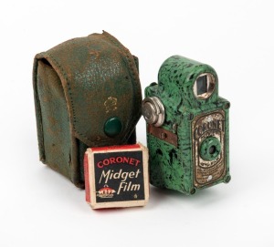 CORONET: Midget subminiature Bakelite camera, c. 1935, in light green with maker's leather case and film spool in maker's box.