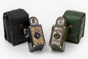 CORONET: Two c. 1935 Midget subminiature Bakelite cameras, both in matching maker's leather cases - one in dark green and one in black. (2 cameras)