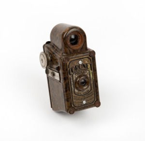 CORONET: Midget subminiature Bakelite camera, c. 1935, in brown.