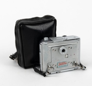 CONCAVA: Tessina Automatic 35 subminiature camera [#363973], c. 1960s, in chrome with Tessinon 25mm f2.8 lens, together with black maker's zip-case and wrist strap.