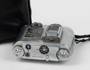 CONCAVA: Tessina&nbsp;Automatic 35 subminiature camera [#363973], c. 1960s, in chrome with Tessinon&nbsp;25mm f2.8 lens, together with black maker's zip-case and wrist strap. - 3