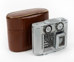 CONCAVA: Tessina Automatic 35 subminiature camera [#163711], c. 1960s, in chrome with Tessinon 25mm f2.8 lens, together with maker's brown leather case.