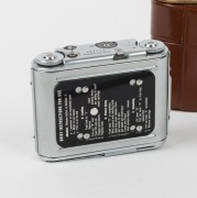 CONCAVA: Tessina&nbsp;Automatic 35 subminiature camera [#163711], c. 1960s, in chrome with Tessinon&nbsp;25mm f2.8 lens, together with maker's brown leather case. - 2