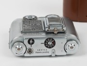 CONCAVA: Tessina&nbsp;Automatic 35 subminiature camera [#163711], c. 1960s, in chrome with Tessinon&nbsp;25mm f2.8 lens, together with maker's brown leather case. - 3