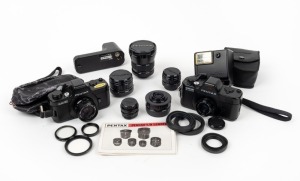 ASAHI KOGAKU: Two black c. 1980 miniature SLR cameras together with several accessories - one Pentax Auto 110, one Pentax Auto 110 Super, seven different lenses, three lens filters, one Pentax 110 Winder II, one AF130P flash unit in case, one camera case,