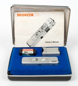 MINOX: Minox BL subminiature camera [#1214336], c. 1973, in chrome with Minox 15mm f3.5 lens. Offered in black maker's case with Minox C4 flash accessory, film case, and instruction booklet.