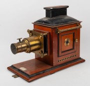 PERKEN, SON & RAYMENT: "Optimus"&nbsp;magic lantern with mahogany body and brass fittings, c. 1880s. - 2