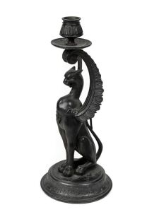 An antique Continental griffin candlestick, 19th century, 30.5cm high