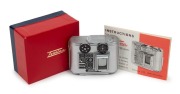 CONCAVA: Tessina L subminiature camera [#785023], c. 1980s, in chrome with Tessinon&nbsp;25mm f2.8 lens. Offered in maker's box with instruction booklet and warranty card.