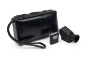 CONCAVA: Two rare black c. 1970s&nbsp;Tessina&nbsp;35 accessories in black leather case - one Pentaprism Viewfinder attachment together with one DIN ASA Light Meter attachment.&nbsp;(2 items)