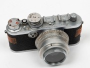 LEITZ: 16905/AKGRSU underwater housing for Leica If/IIf/IIIf, produced&nbsp;c. 1954 in conjunction with famed Austrian diving technology pioneer Hans Haas and his Viennese firm 'Akustische und Kinoger&auml;te'. Attached to housing is a c. 1955 red-dial Leica If cam - 2