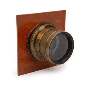 TAYLOR, TAYLOR & HOBSON: Brass Series II 8½ x 6½" Cooke lens on board, c. 1910s, lens diameter 60mm and total height approx. 80mm, featuring retailer's engraving 'Sole Consignees for Australia Baker & Rouse Ppy L'.